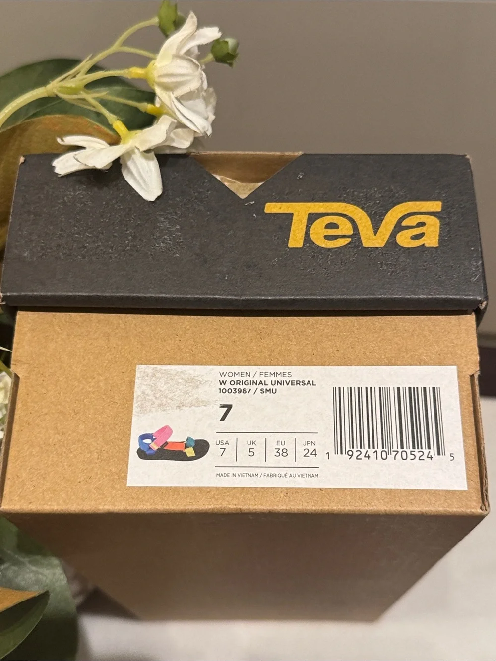 Teva Original Universal sandals in a 90s multi-color pattern